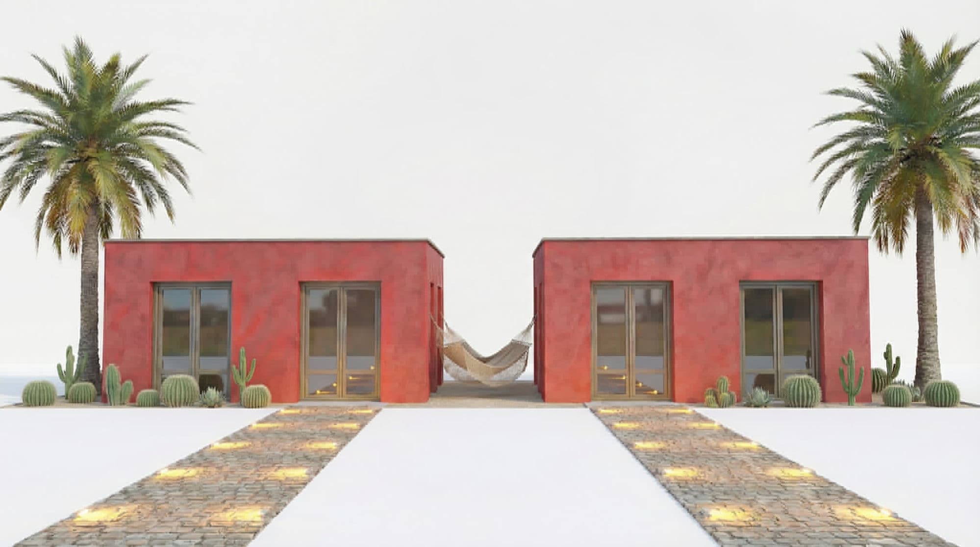 Vue de face des deux bungalows de répit en pisé rouge, encadrés de palmiers dattiers et de cactus, avec un hamac tendu entre les deux et deux allées en pierres lumineuses au sol